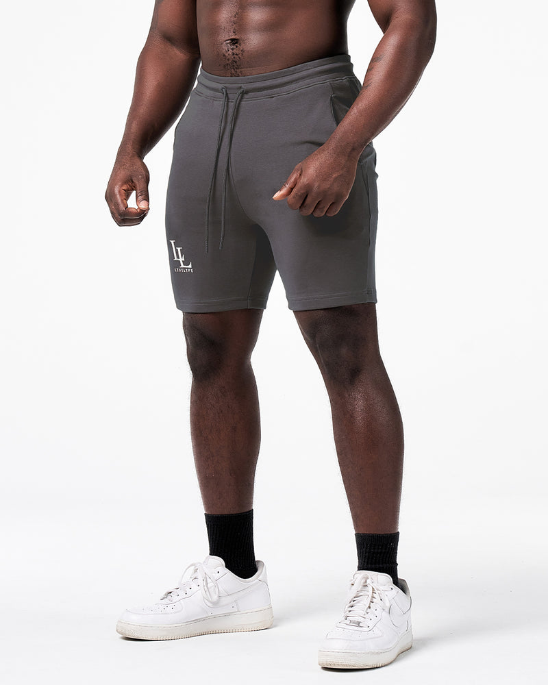 Dark grey men's shorts with white lyftlyfe logo at the front.