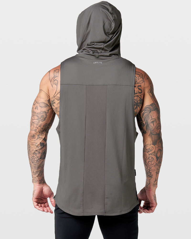 Mens hooded tank top in grey with a reflective Dominate Adversity logo at center chest.