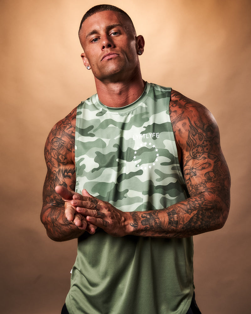 Men's tank top in Green. Camo at the top half and green at the bottom.
