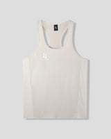Beige tank top with a logo on a light gray background