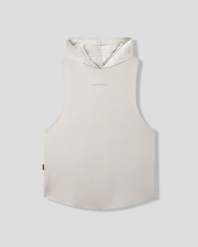 Beige sleeveless vest with a hood on a light gray background