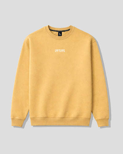 Yellow women's oversized crewneck with 'LYFLYFE' logo on a gray background