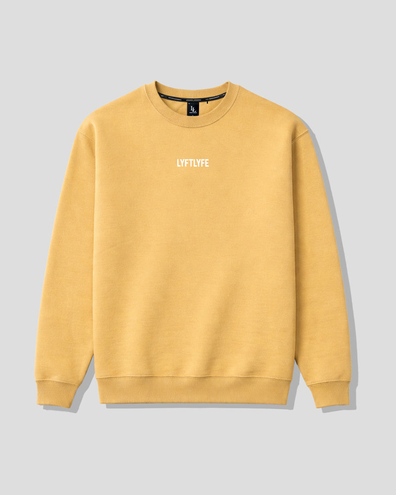 Yellow women's oversized crewneck with 'LYFLYFE' logo on a gray background