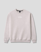 Oversized women's crewneck in off-white with a brand logo on a light gray background