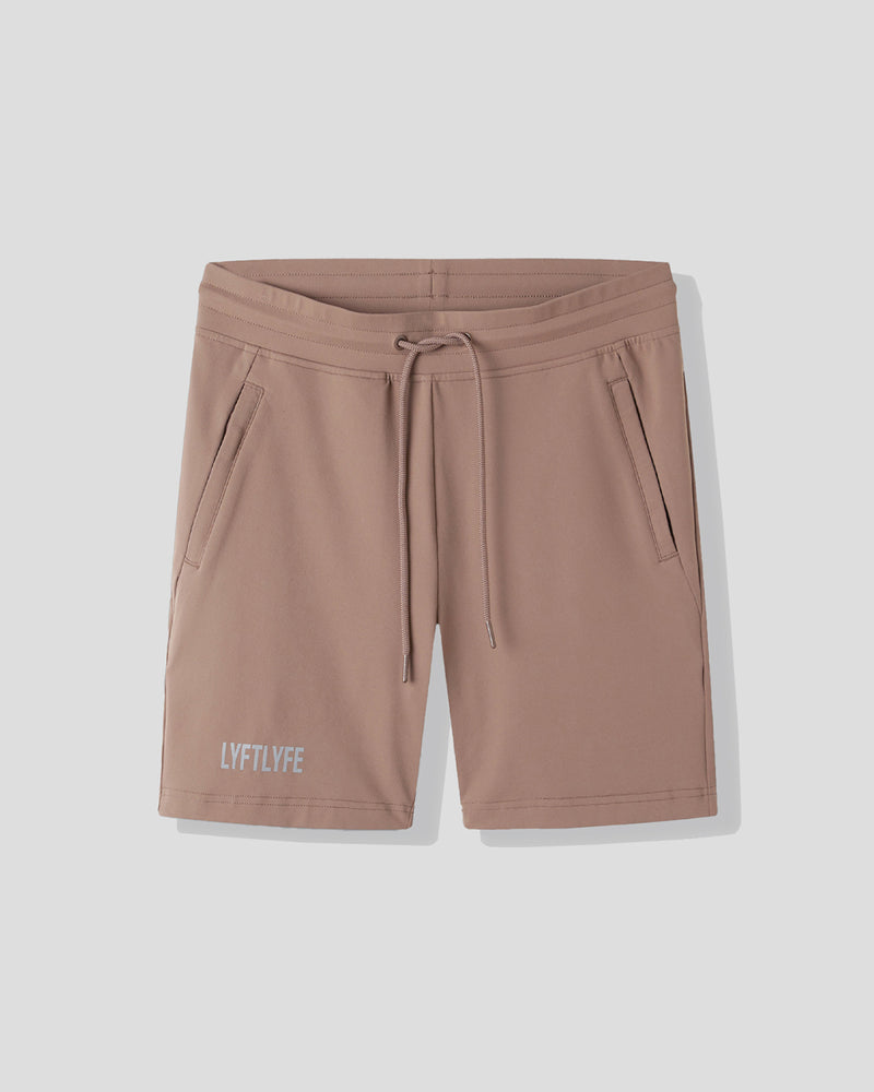 Brown shorts with a drawstring on a light gray background