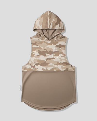 Light brown camouflage sleeveless hoodie with a white brand logo on a light gray background