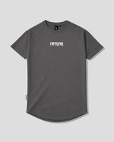 Charcoal grey LYFTLYFE contour t-shirt with white logo on light grey. 