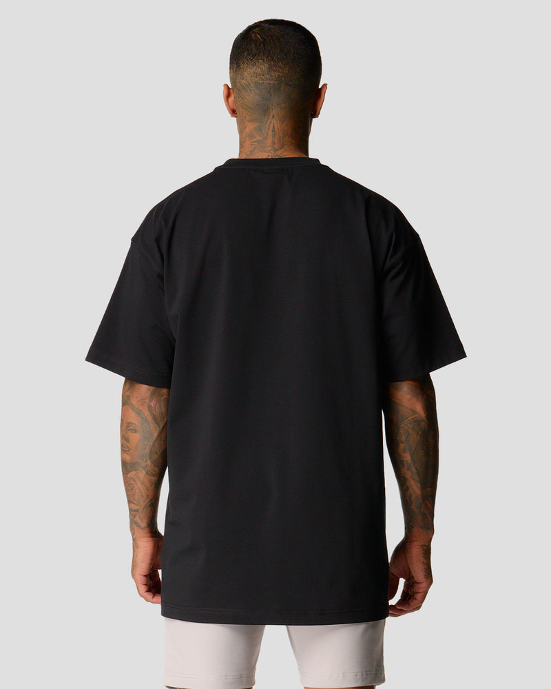 Oversized men’s T-shirt in black with a large white Lyftlyfe logo, made from soft premium cotton.