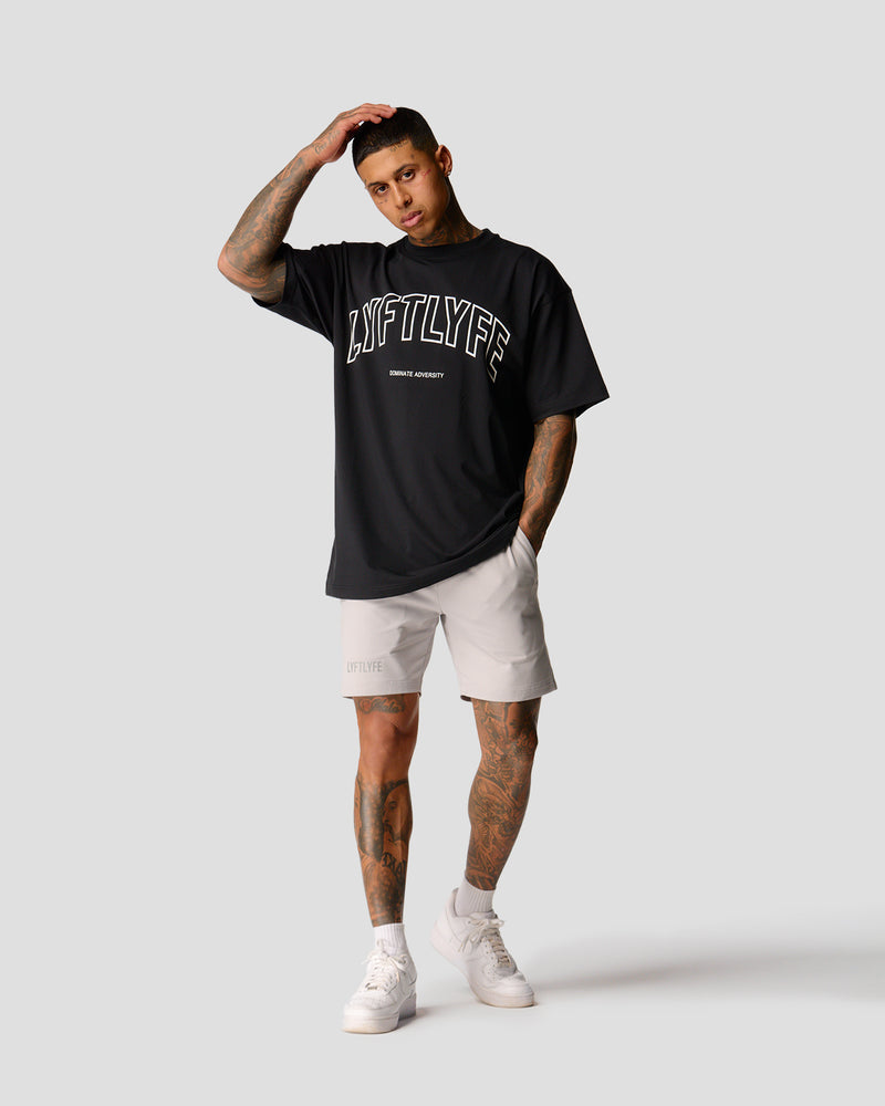 Oversized men’s T-shirt in black with a large white Lyftlyfe logo, made from soft premium cotton.