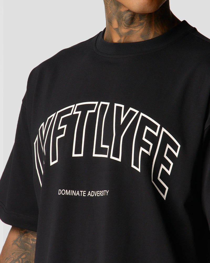 Oversized men’s T-shirt in black with a large white Lyftlyfe logo, made from soft premium cotton.