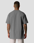 Back view of men's oversized T-shirt in grey, premium cotton, with a relaxed fit. 