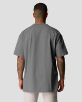 Back view of men's oversized T-shirt in grey, premium cotton, with a relaxed fit. 