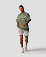 Oversized men’s T-shirt in green with a large white Lyftlyfe logo on the chest.