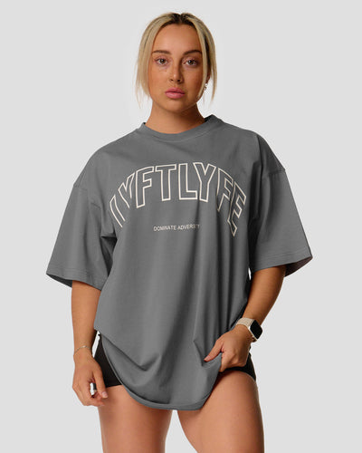 Women's oversized T-shirt in grey, cotton, with a large Lyftlyfe logo on the chest.