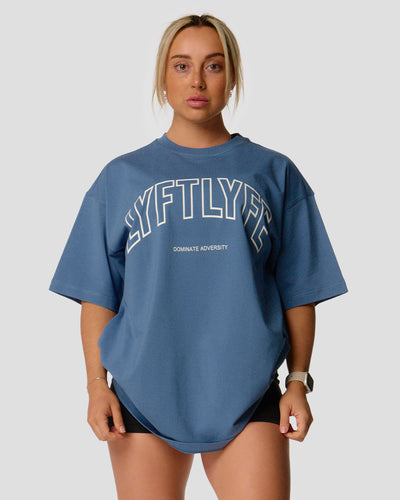 Women's oversized T-shirt in blue, cotton, with a large Lyftlyfe logo on the chest.