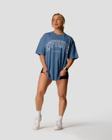 Women's oversized T-shirt in blue with a large white Lyftlyfe logo. 
