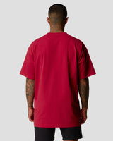 Back view of men's oversized T-shirt in red, premium cotton, with a relaxed fit.