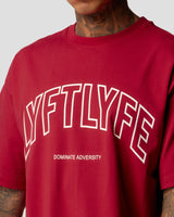 Front chest detail of men's red oversized T-shirt with bold Lyftlyfe branding.