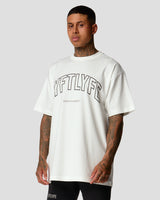 Right side view of men's oversized T-shirt in white, premium cotton, with a large Lyftlyfe logo on the chest.