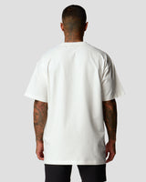 Back view of men's oversized T-shirt in white, premium cotton, with a relaxed fit.