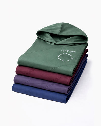 Men’s Dominance Sleeveless Hoodie 4 pack folded training hooded tanks in green, prune, purple, and navy