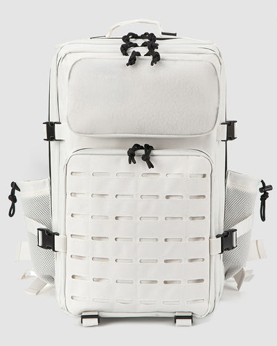 White backpack with black straps on a light gray background