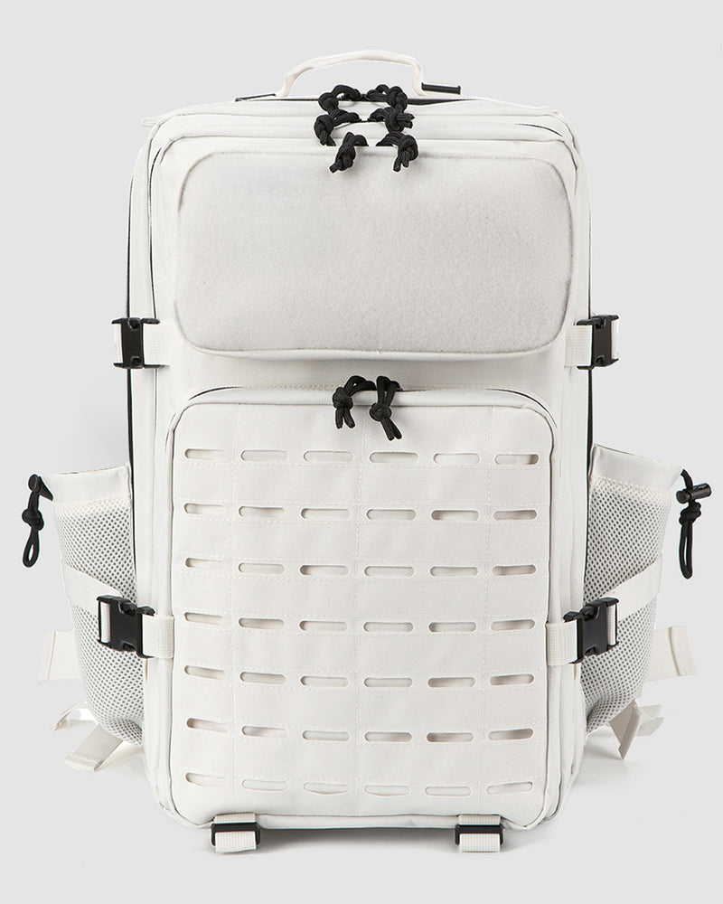White backpack with black straps on a light gray background