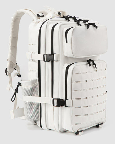 White backpack with black straps on a light gray background