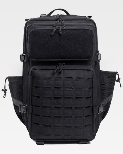 Black tactical backpack on a light gray background