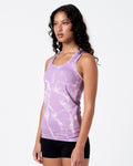 Left side angle of women’s light purple marble tank with racerback and curved hem.
