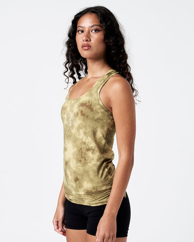 Full front pose of the green sponge print women's performance tank top.