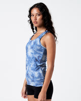 Left side view of LYFTLYFE women’s tank in blue, highlighting side seam and racerback fit.