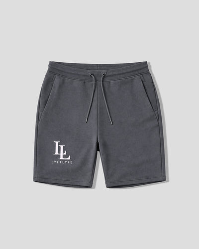 Charcoal grey shorts with a white LL logo on a light gray background