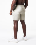 Rear view of men’s light grey LYFT shorts with dual flat seam pockets for functional storage.