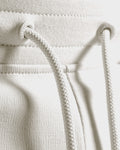 Detail shot of custom LYFTLYFE drawstring and elastic waistband in light grey.