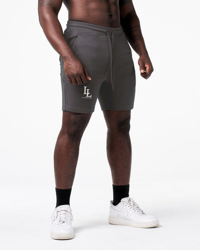 LYFT men’s gym shorts in dark grey with 3D rubber logo, designed for movement and performance.
