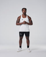 Athletic model in LYFTLYFE White Power Stringer full shot.