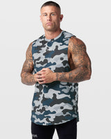 Left side view of Limitless Men’s Cut Sleeve in blue camo, showing wide arm opening and split bottom hem for mobility.