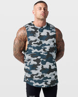 Limitless cut sleeve tank in blue camo, highlighting reflective logo and four-way stretch fabric.