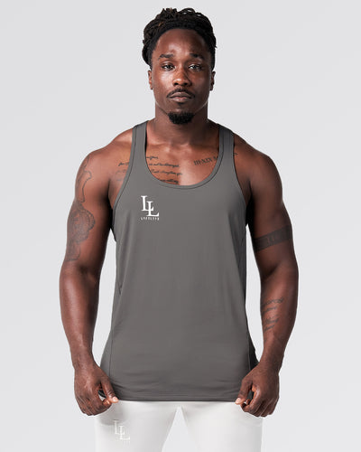 Gray tank top with a logo on a light gray background