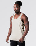 Left side profile of Mesh-paneled athletic tank in off-white.