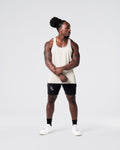 Head-to-toe look with off-white gym stringer and black shorts. 