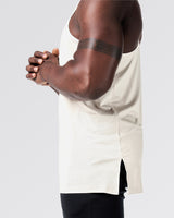 Close-up of side mesh detail on off-white gym stringer.