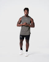 Men’s sleeveless training tank in grey, crafted with moisture-wicking tri-blend and minimal branding.