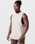 Left Side view of off-white Limitless sleeveless gym tank, showing relaxed fit and ergonomic armhole design.