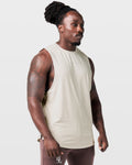 Right Side view of off-white Limitless sleeveless gym tank, showing relaxed fit and ergonomic armhole design.