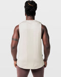Back view of Limitless Men’s Cut Sleeve in off-white, highlighting ventilated mesh panel and scalloped hem.