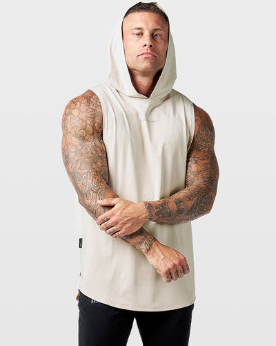 Mens hooded tank top in off white with a reflective Dominate Adversity logo at center chest.