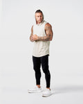 Side view of Limitless Men’s Sleeveless Hoodie in off-white with hood, split hem, and reflective chest logo.