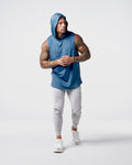 Front view of Limitless Men’s Sleeveless Hoodie in dark blue with hood, split hem, and reflective chest logo.vvv